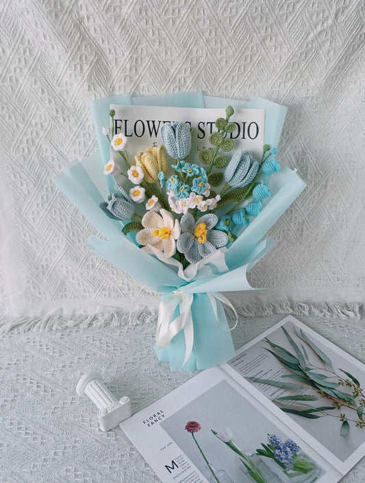 Holiday Bloom Gift: Meticulously crafted, luxury-wrapped bouquet of permanent flowers; the sustainable, Christmas present
